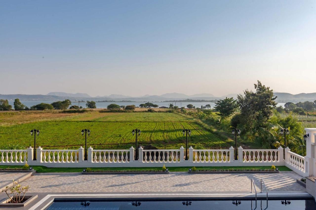 Stayvista's Lake La Vie: Tranquil Lakeside Villa with Pool and Farmland Views Nashik Exterior photo
